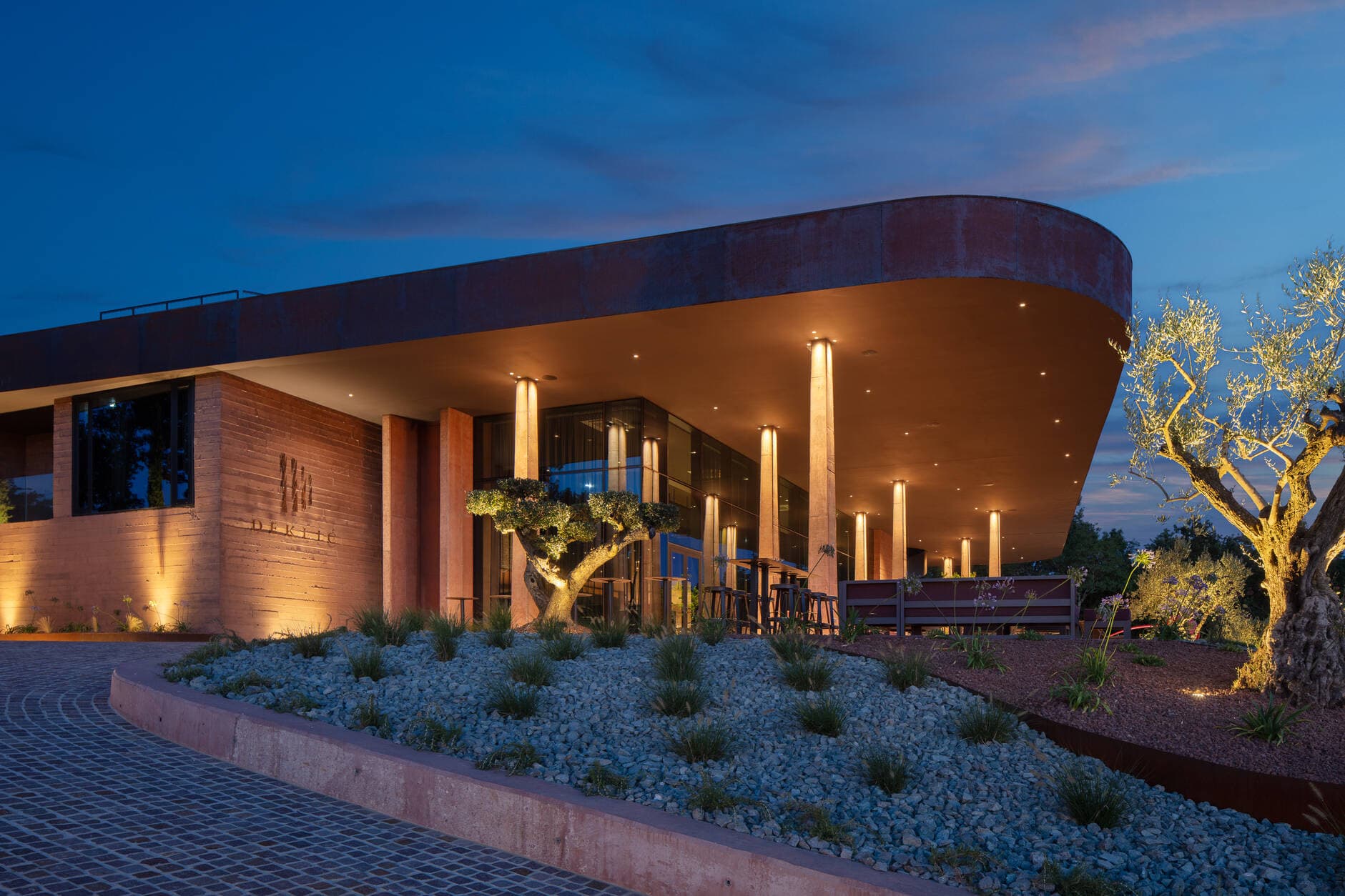 Deklič winery's tasting room lit at dusk
